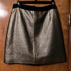 Gold metallic and black Elie Tahari designer skirt size 8. Excellent condition.